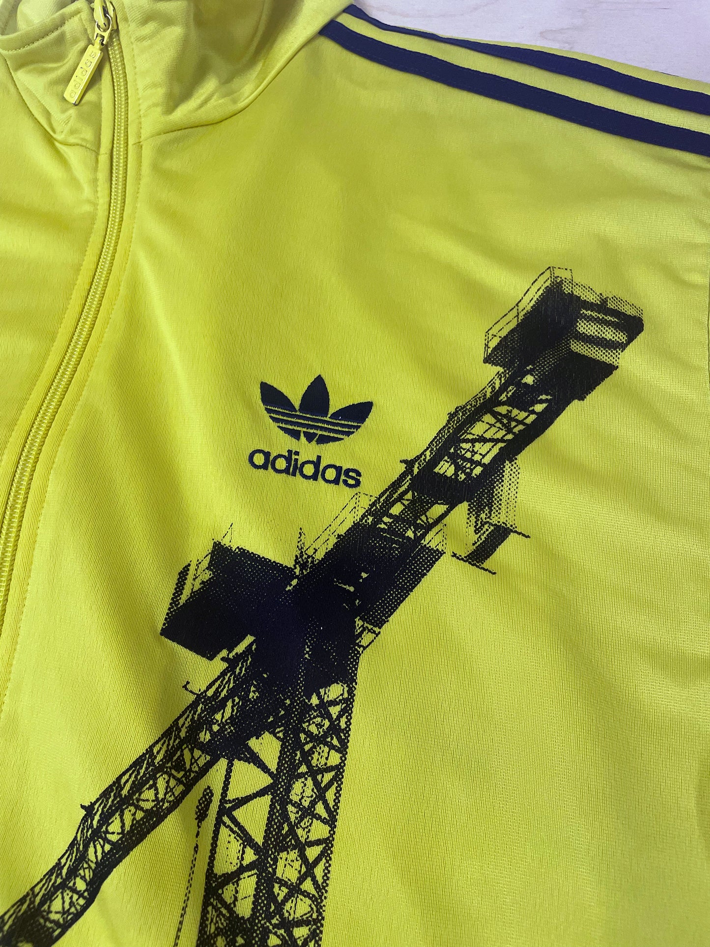 Neon yellow track top with black cranes, Extra Large 46'' chest