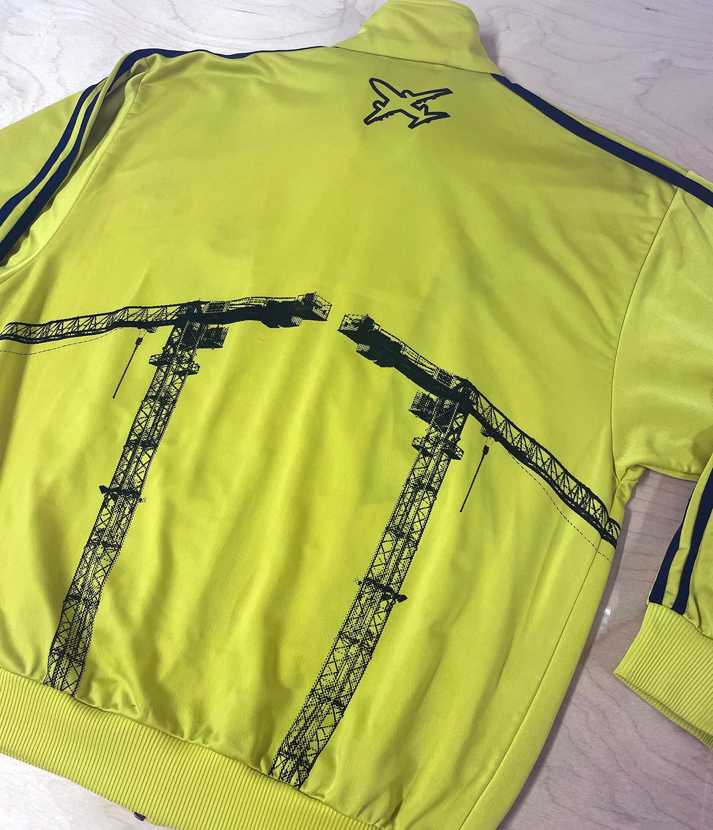 Neon yellow track top with black cranes, Extra Large 46'' chest